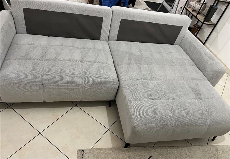 Canapé d'angle gris à motif géométrique nettoyé à domicile par Lustr'o Detailing